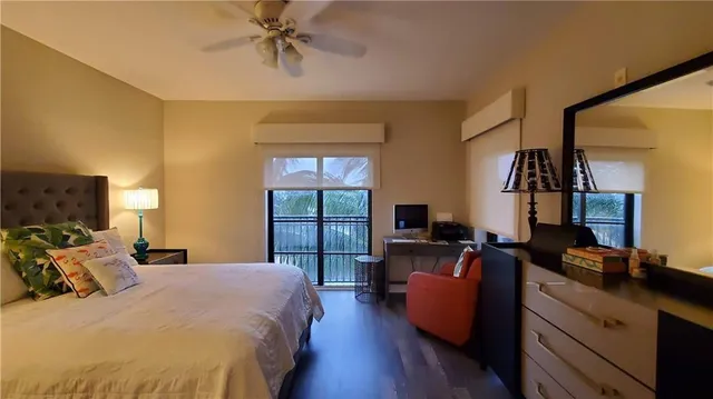 a bed room with a bed window and a couch