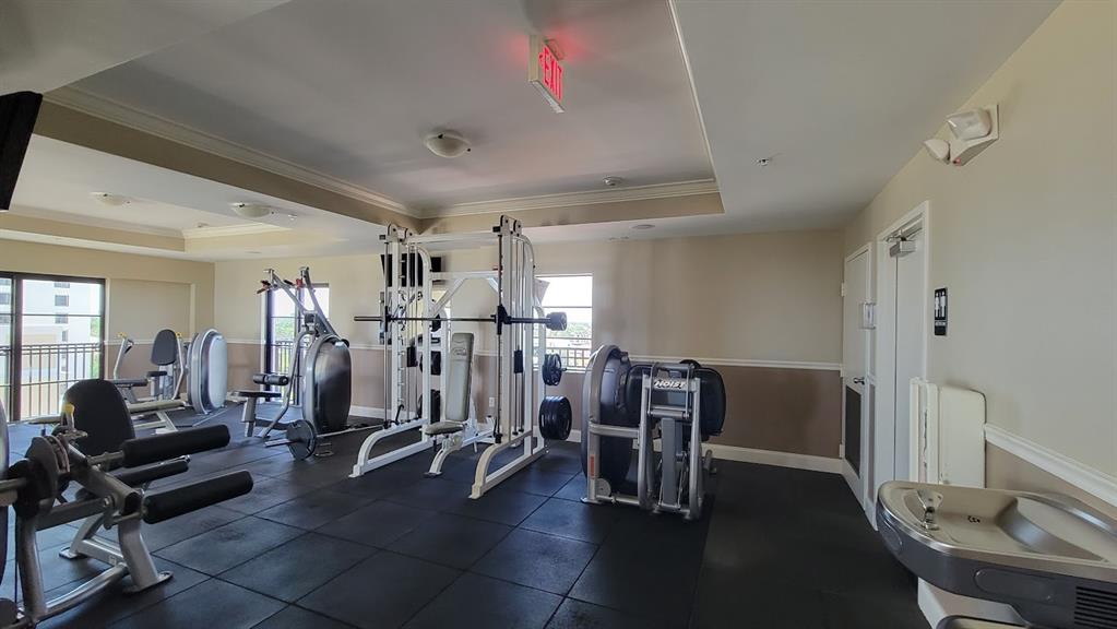 2509 North Ocean Boulevard, Unit 576 Fort Lauderdale, FL 33305 - Photo 6 of 22 a view of a room with gym equipment