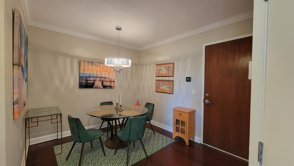 2509 North Ocean Boulevard, Unit 576 Fort Lauderdale, FL 33305 - Photo 8 of 22 a view of a dining room with furniture and window