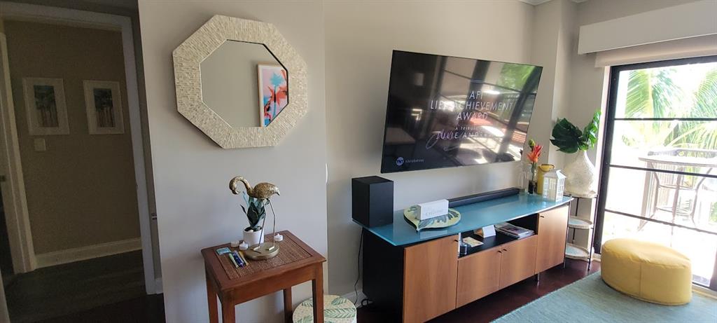 2509 North Ocean Boulevard, Unit 576 Fort Lauderdale, FL 33305 - Photo 9 of 22 a living room with furniture and a window