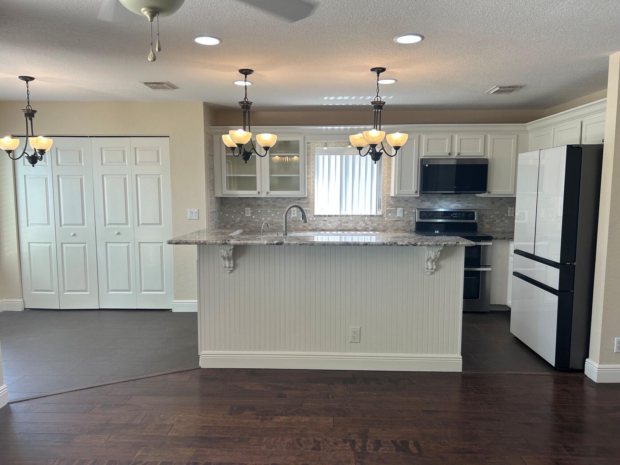 1019 Big Torch Street Riviera Beach, FL 33407 - Photo 6 of 41 2 (3)