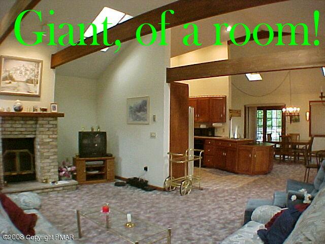 Red Rock Road Cresco, PA 18326 - Photo 4 of 11 a living room with furniture and a fireplace