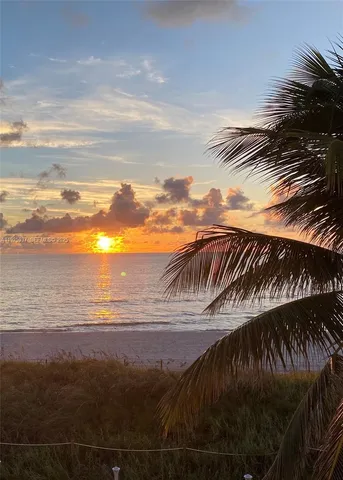 a view of beach and ocean