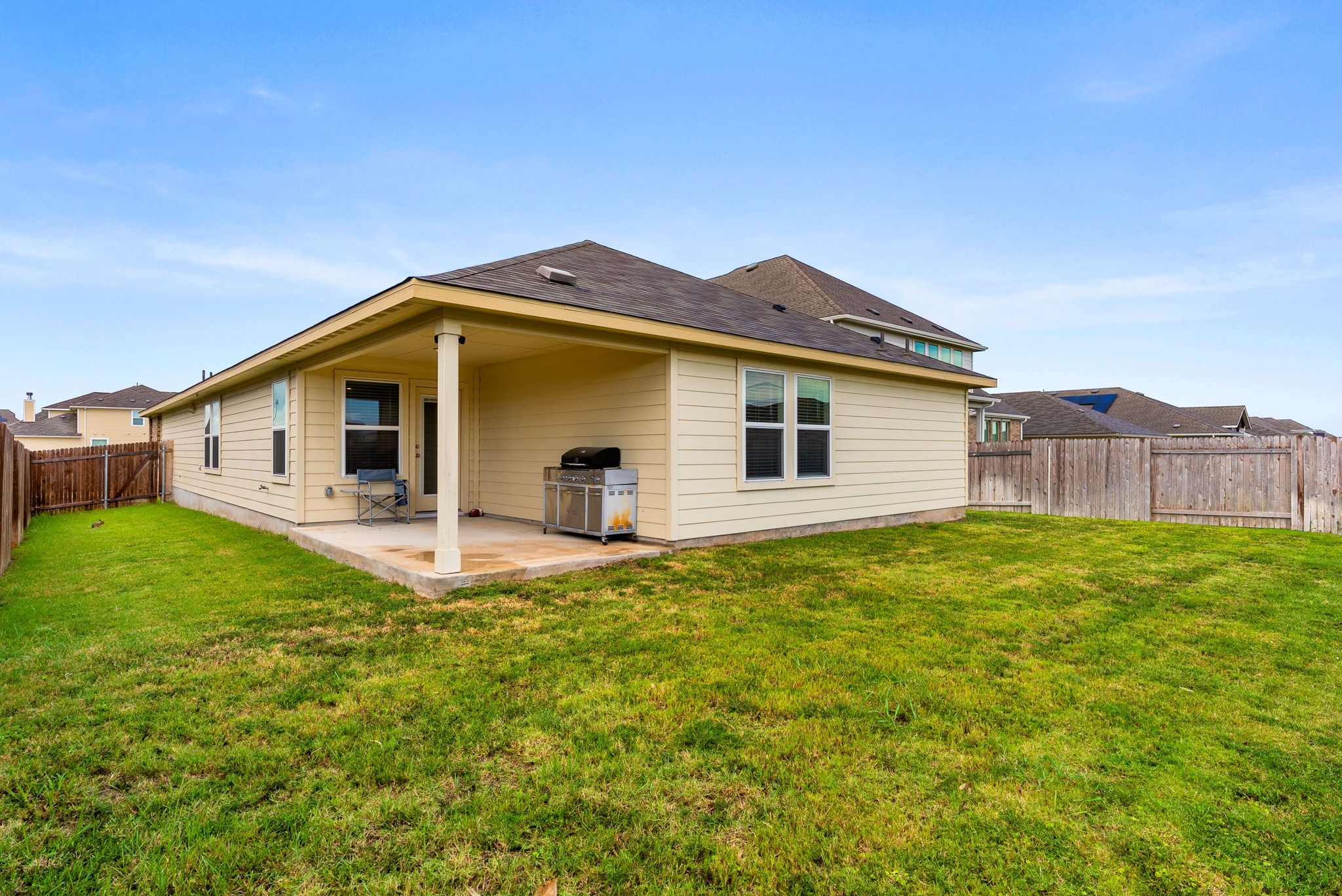304 Giorgio Moroder Drive Hutto, TX 78634 - Photo 27 of 31 a house view with a backyard space