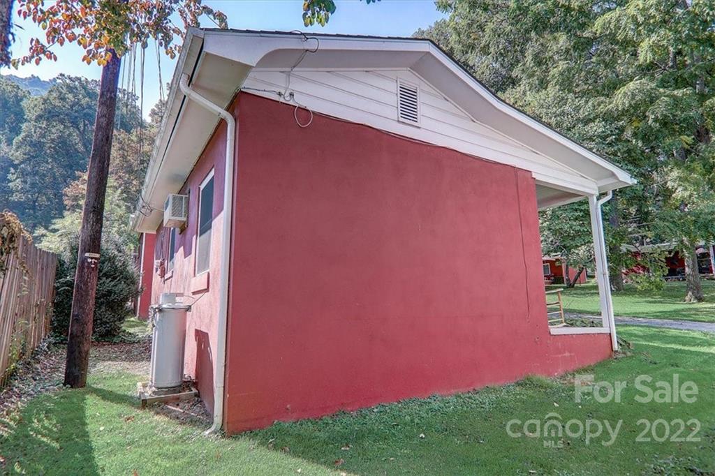 1555 Soco Road, Unit 3 Maggie Valley, NC 28751 - Photo 12 of 40 a view of backyard of house with green space