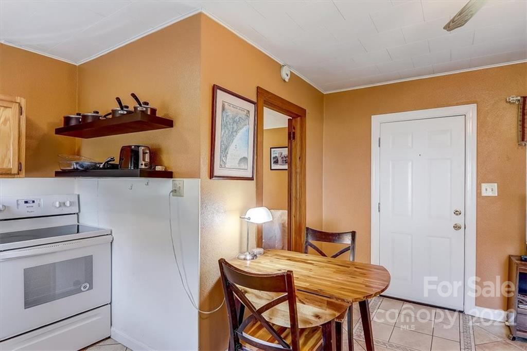 1555 Soco Road, Unit 3 Maggie Valley, NC 28751 - Photo 24 of 40 a workspace with furniture and window