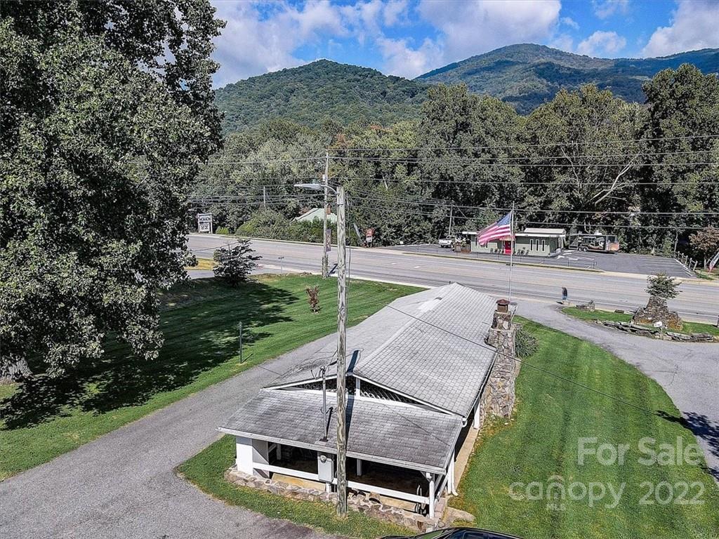 1555 Soco Road, Unit 3 Maggie Valley, NC 28751 - Photo 39 of 40 a view of a swimming pool with a yard