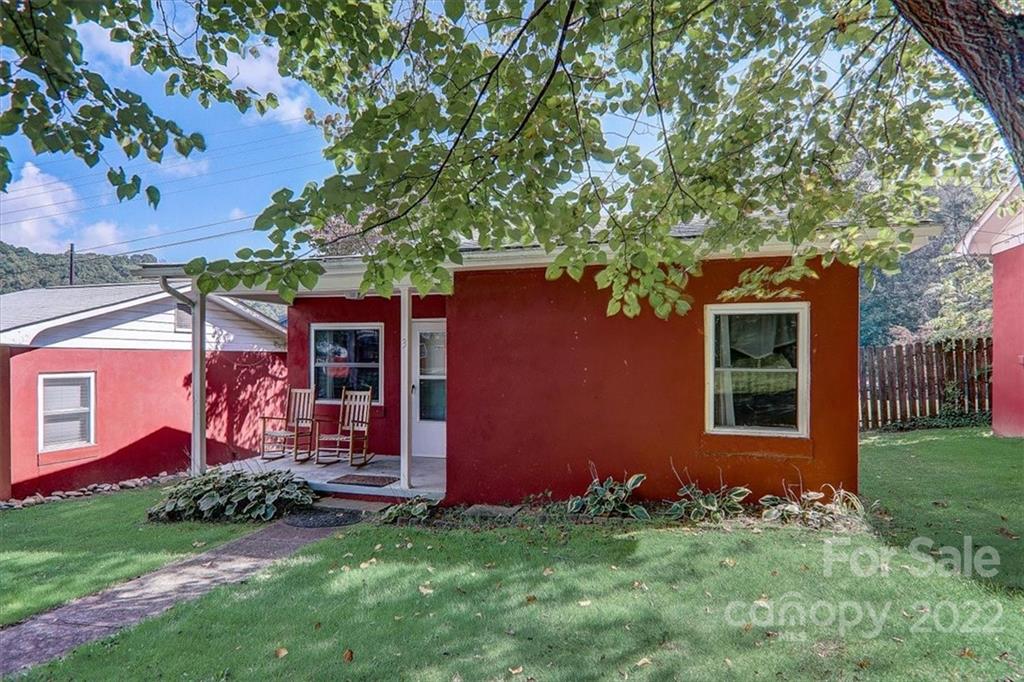 1555 Soco Road, Unit 3 Maggie Valley, NC 28751 - Photo 6 of 40 front view of a house with a yard
