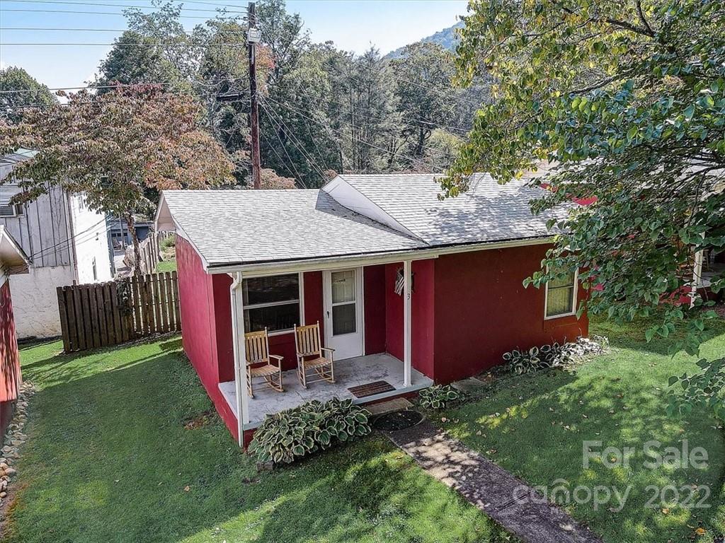 1555 Soco Road, Unit 3 Maggie Valley, NC 28751 - Photo 7 of 40 a view of backyard of house with green space