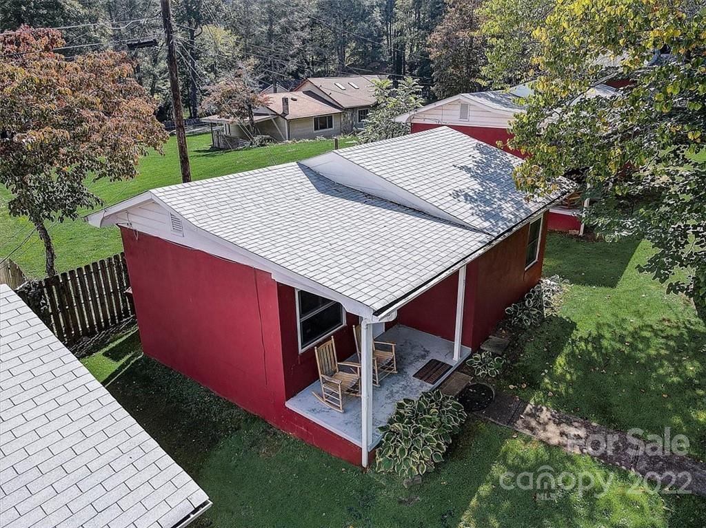 1555 Soco Road, Unit 3 Maggie Valley, NC 28751 - Photo 8 of 40 aerial view of a house with a yard