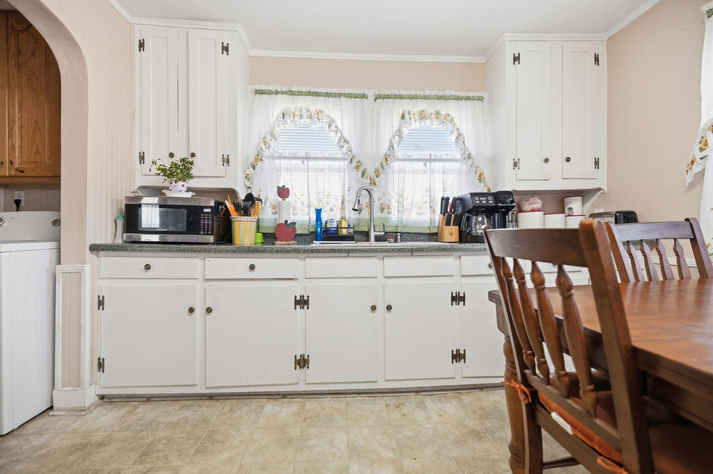 3212 Dixon Road Anderson, SC 29625 - Photo 15 of 23 This spacious kitchen offers ample cabinetry, generous counter space, and a functional layout.