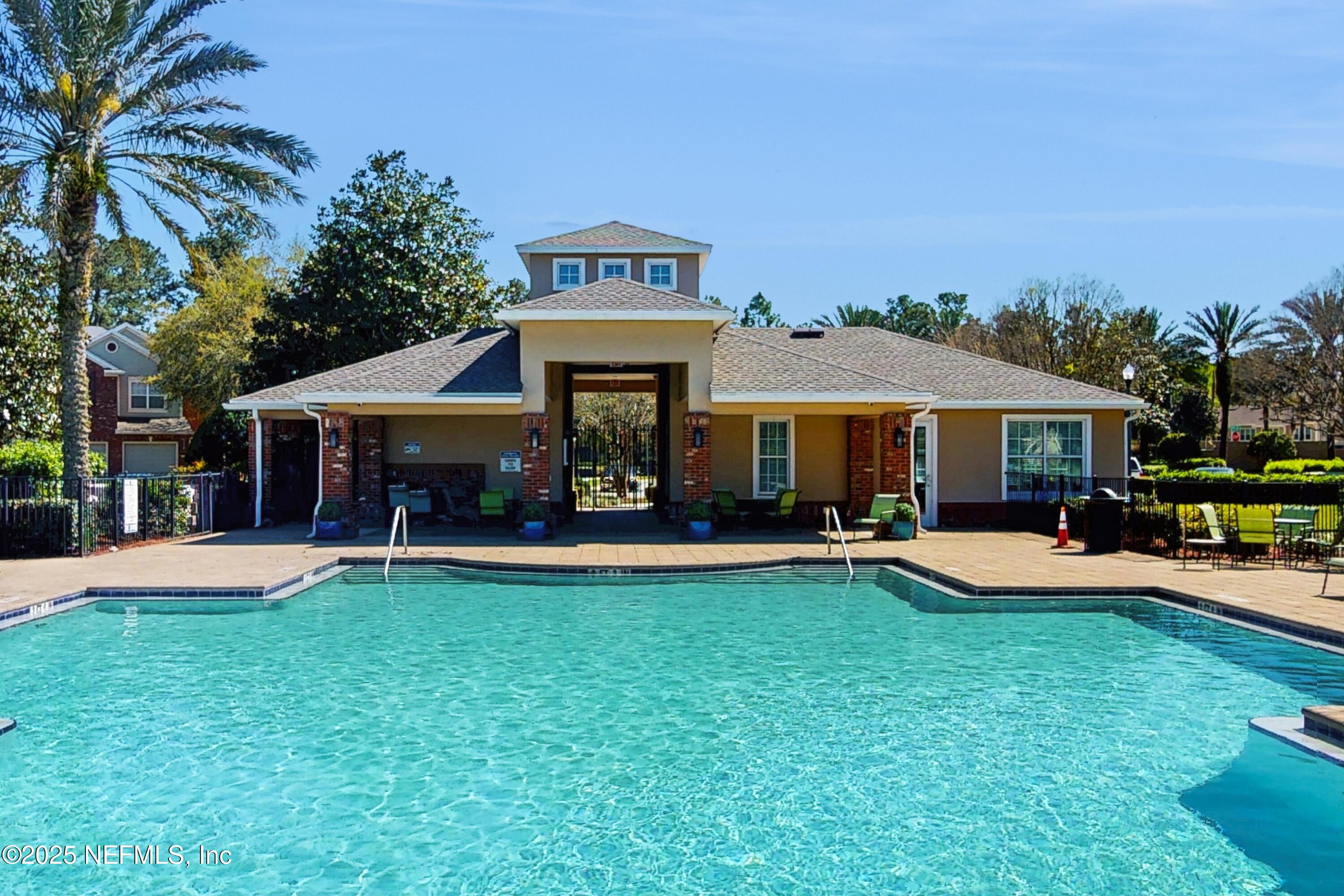 7030 Roundleaf Drive Jacksonville, FL 32258 - Photo 15 of 39 a view of a house with swimming pool and sitting area
