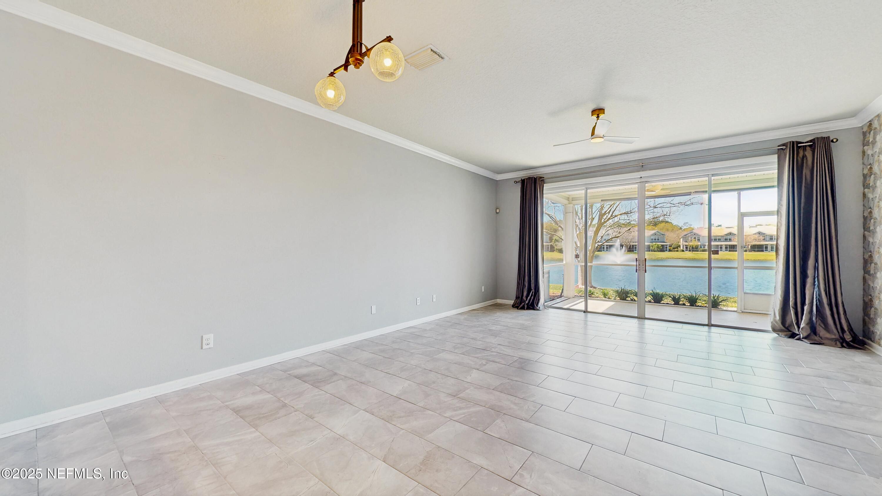 7030 Roundleaf Drive Jacksonville, FL 32258 - Photo 16 of 39 a view of an empty room with a window