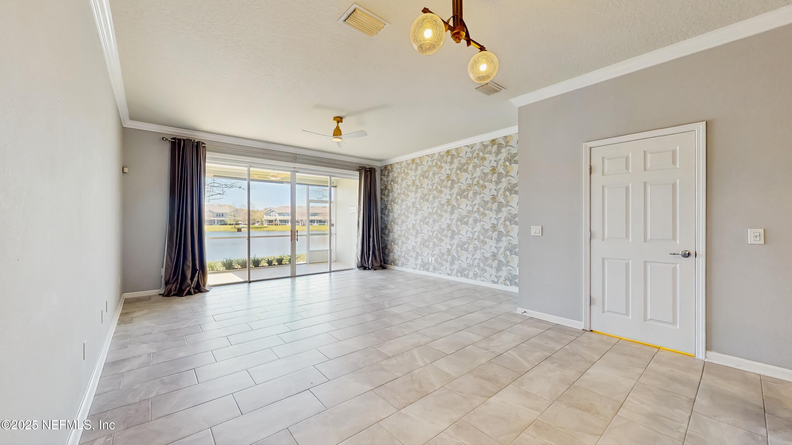 7030 Roundleaf Drive Jacksonville, FL 32258 - Photo 17 of 39 a view of an empty room with a window