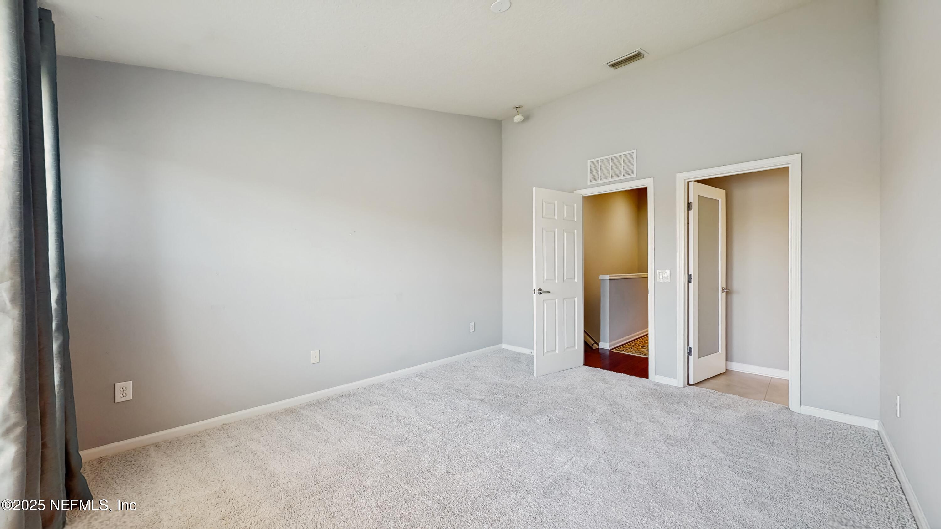 7030 Roundleaf Drive Jacksonville, FL 32258 - Photo 23 of 39 a view of an empty room and closet area