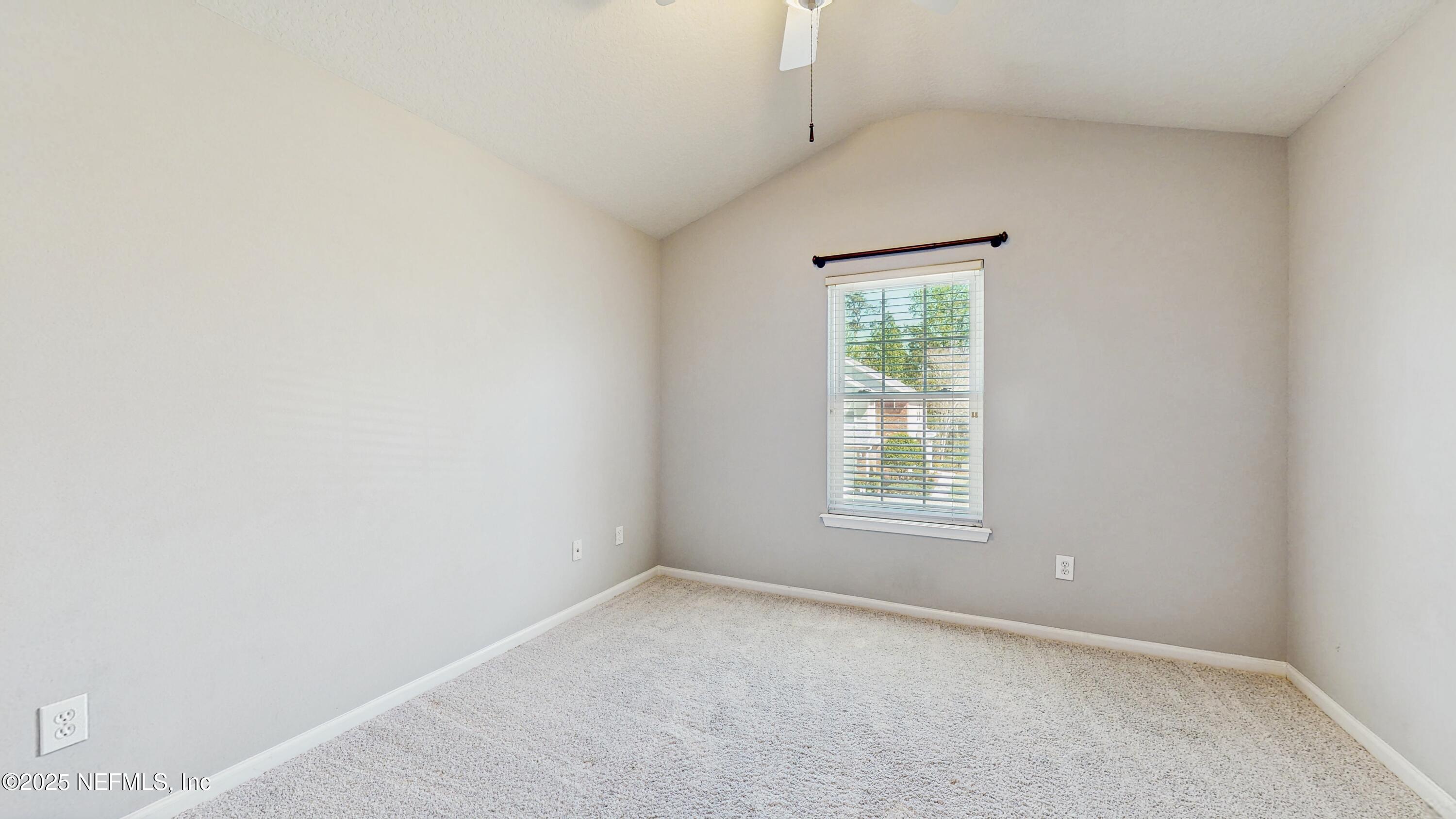 7030 Roundleaf Drive Jacksonville, FL 32258 - Photo 28 of 39 an empty room with a window