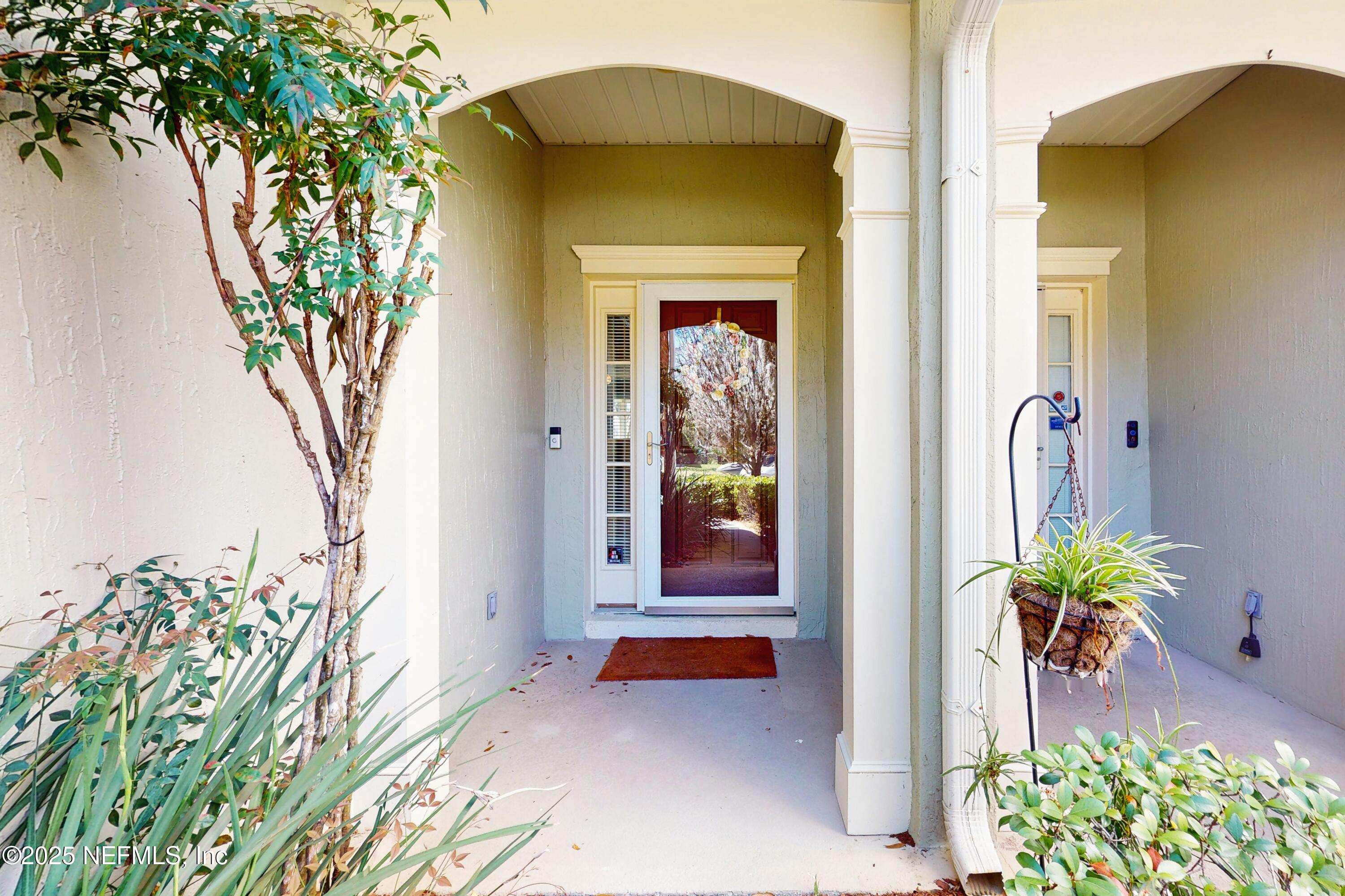 7030 Roundleaf Drive Jacksonville, FL 32258 - Photo 31 of 39 a front view of a house with a yard
