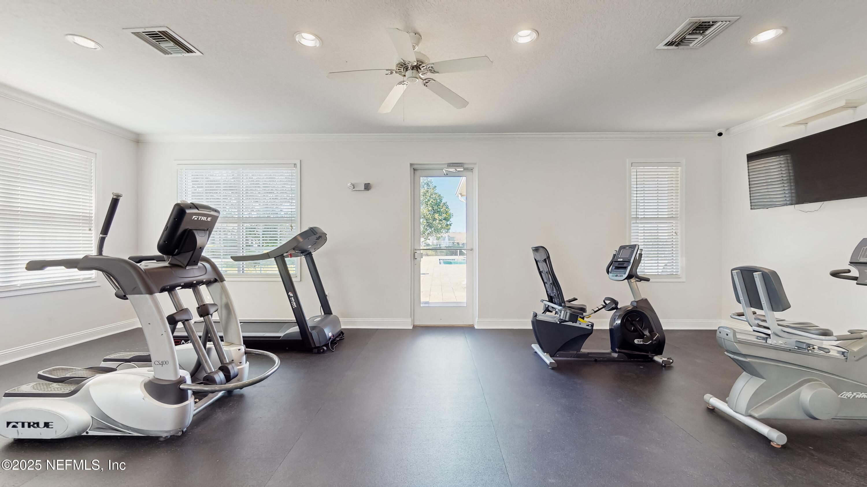 7030 Roundleaf Drive Jacksonville, FL 32258 - Photo 36 of 39 a view of a room with gym equipment
