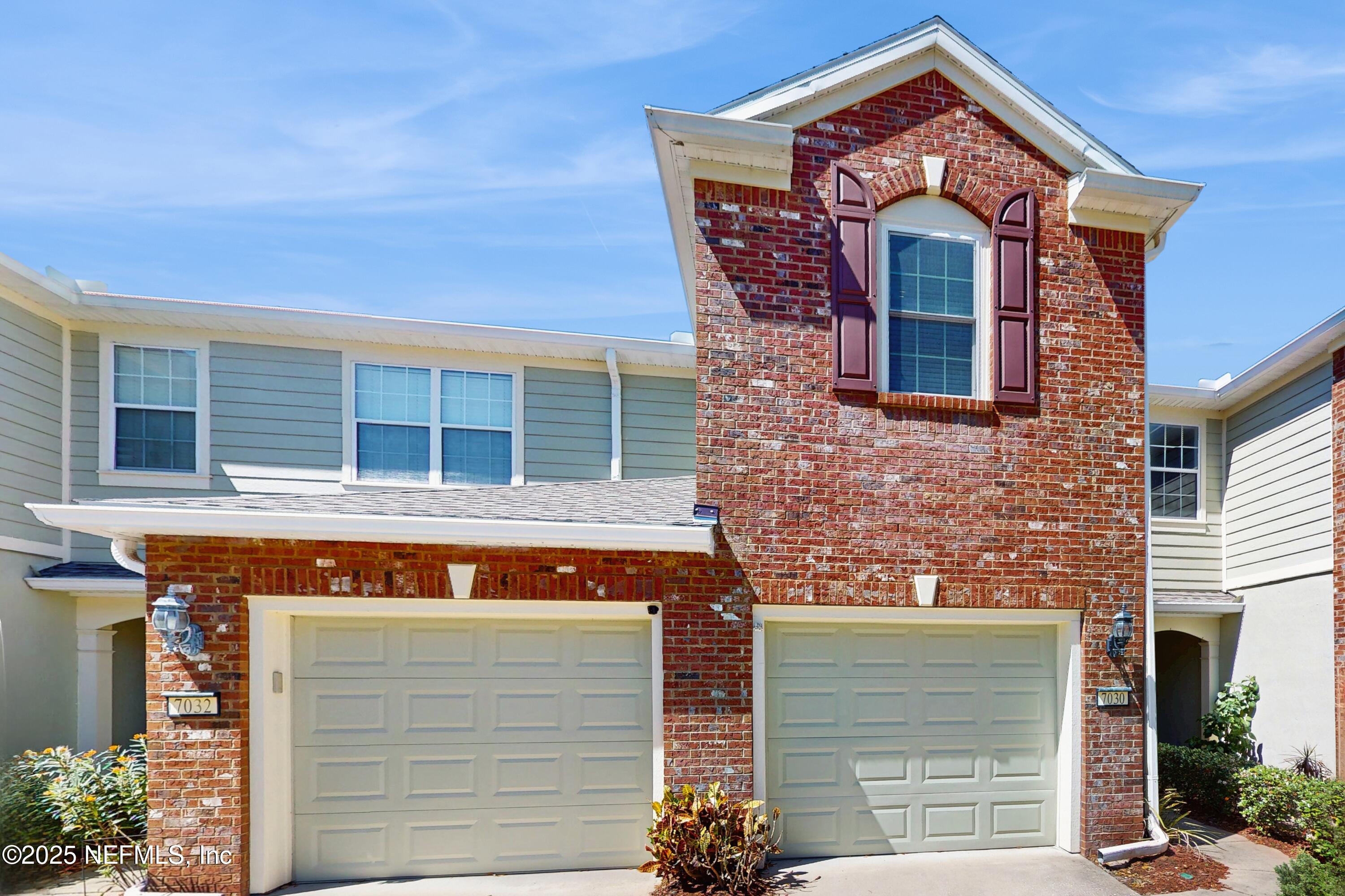 7030 Roundleaf Drive Jacksonville, FL 32258 - Photo 37 of 39 a front view of a house with a garage
