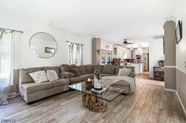 a bathroom with a sink toilet and mirror