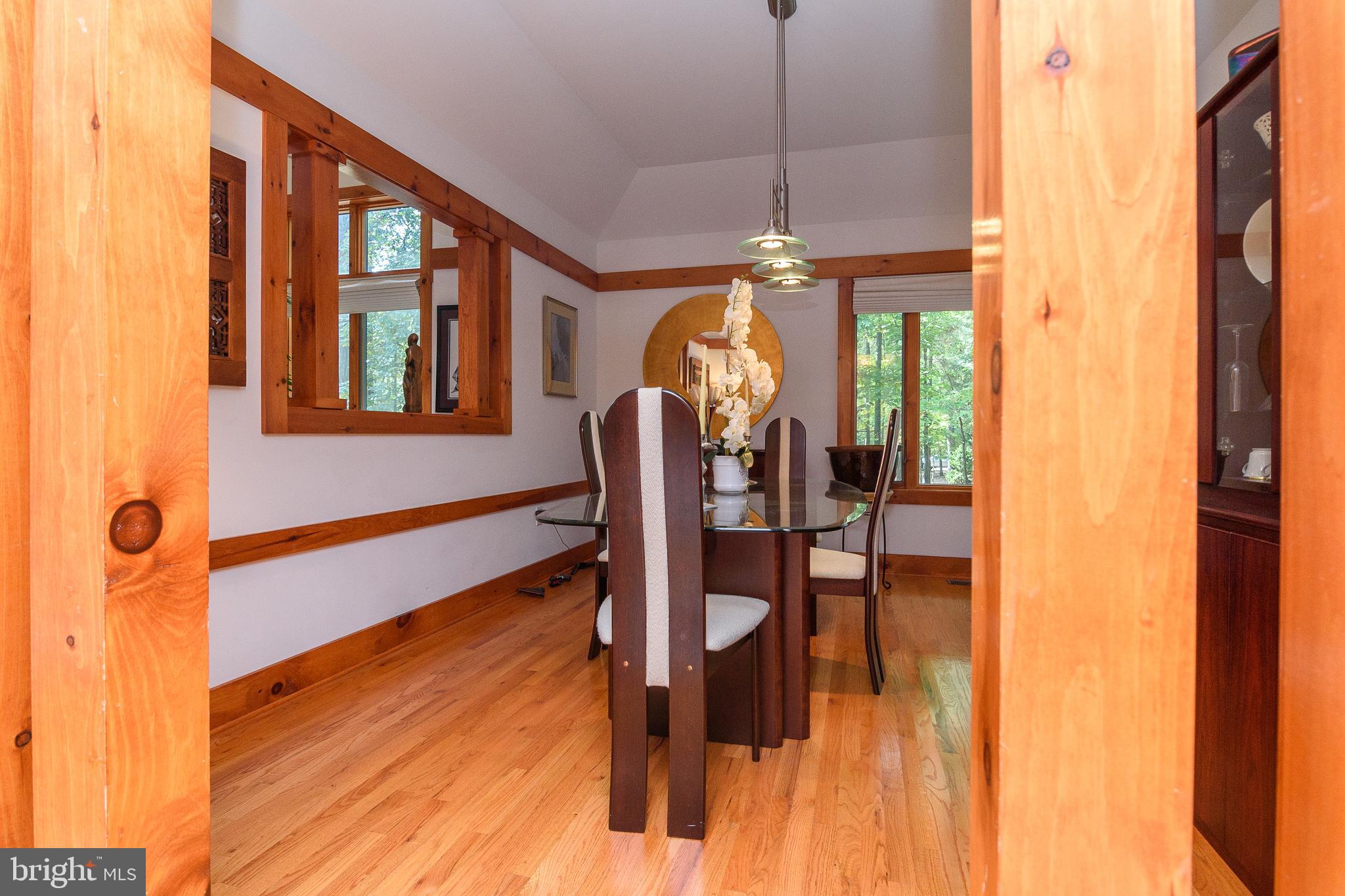 23615 Quail Hollow Circle Lewes, DE 19958 - Photo 12 of 49 a view of a living room with furniture window and wooden floor