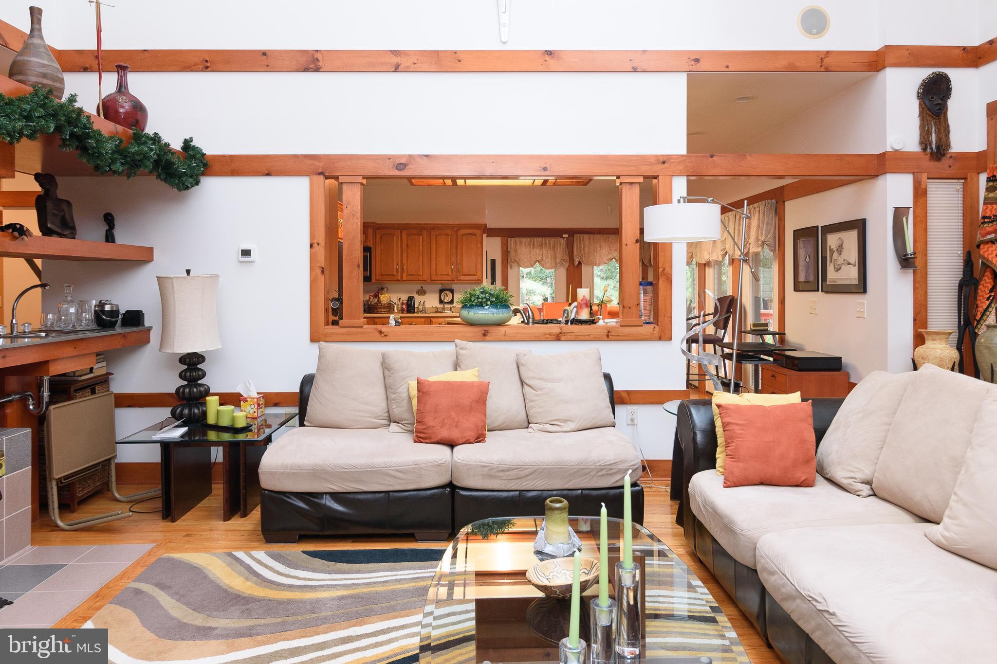 23615 Quail Hollow Circle Lewes, DE 19958 - Photo 21 of 49 a outdoor living space with patio furniture and a potted plant