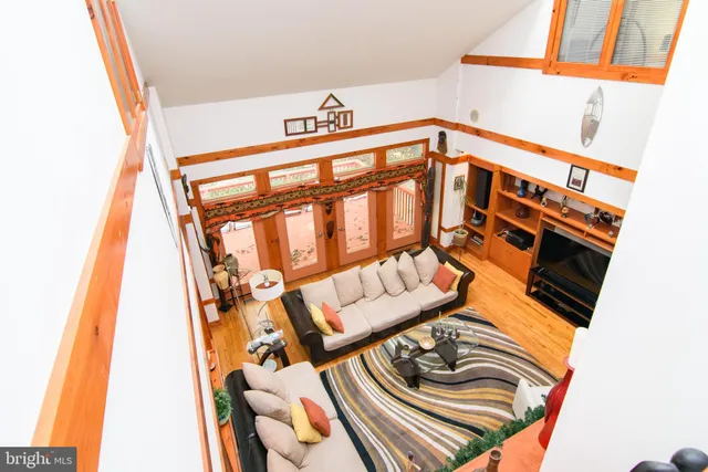 a view of a two chairs in a balcony