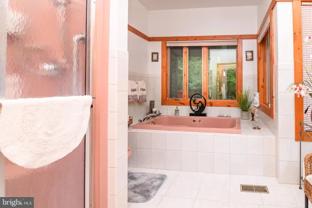 a living room with large windows