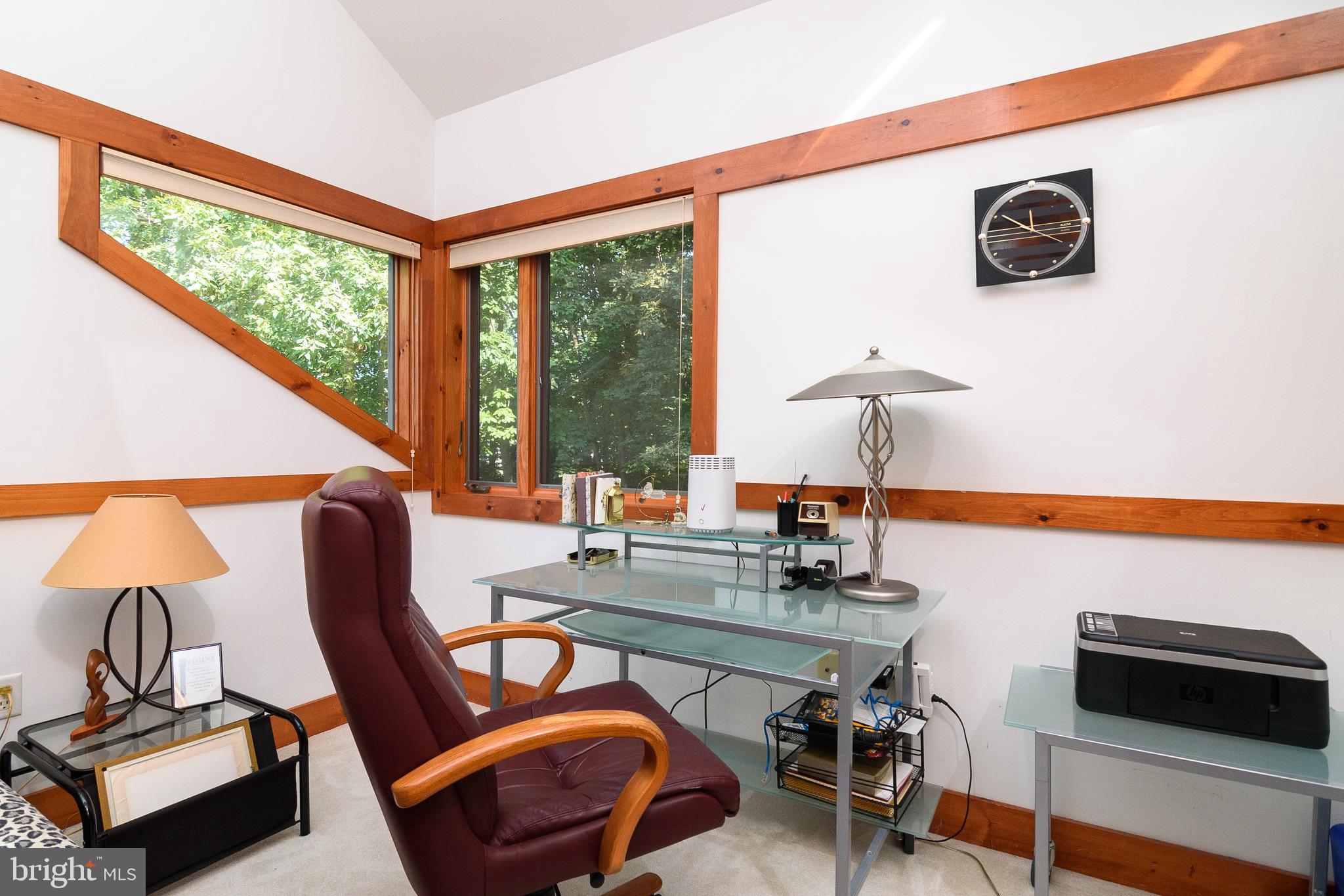 23615 Quail Hollow Circle Lewes, DE 19958 - Photo 35 of 49 a view of a workspace with furniture and a window