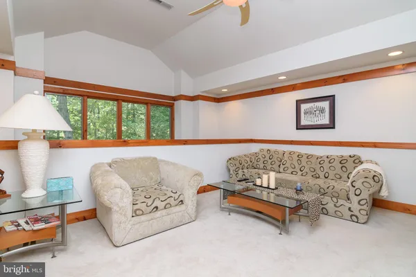 a bedroom with furniture and a couch