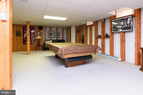 a spacious bedroom with a bed and window