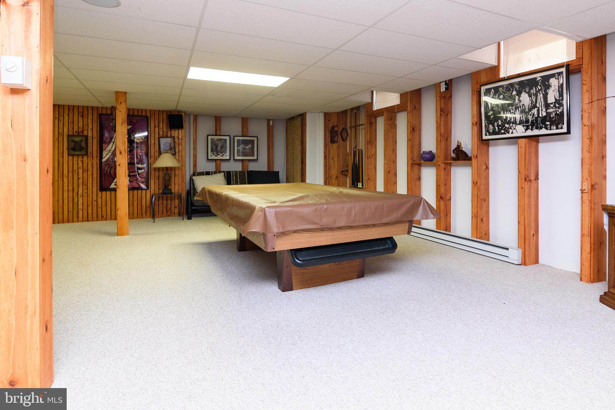 23615 Quail Hollow Circle Lewes, DE 19958 - Photo 45 of 49 a spacious bedroom with a bed and window