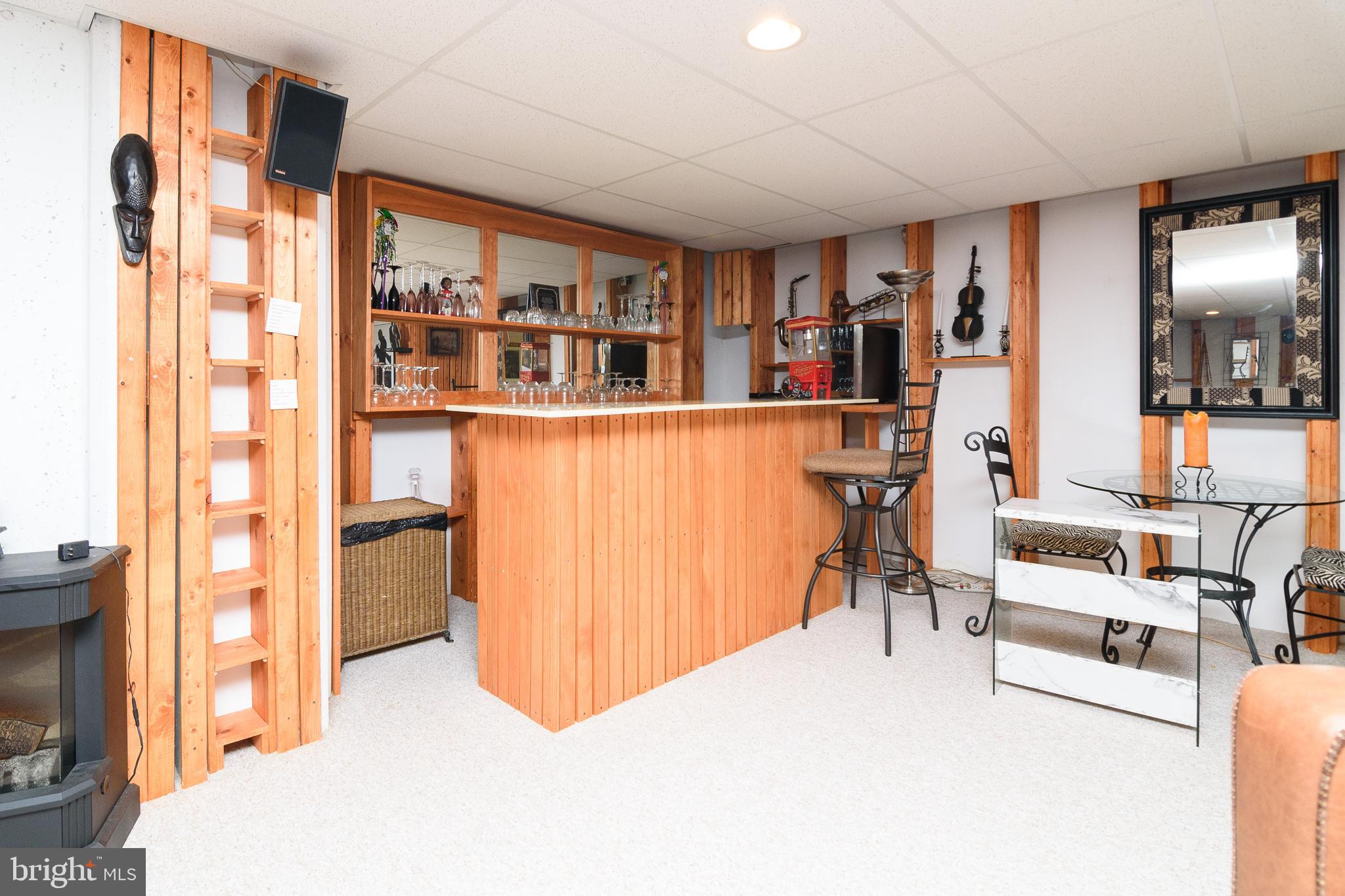 23615 Quail Hollow Circle Lewes, DE 19958 - Photo 48 of 49 a view of livingroom with furniture and staircase