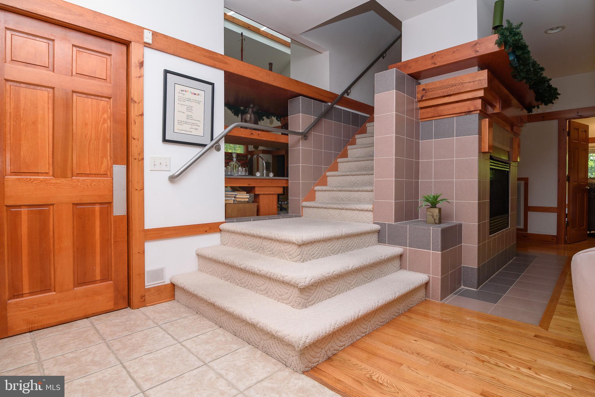 23615 Quail Hollow Circle Lewes, DE 19958 - Photo 7 of 49 a view of entryway and hall with wooden floor