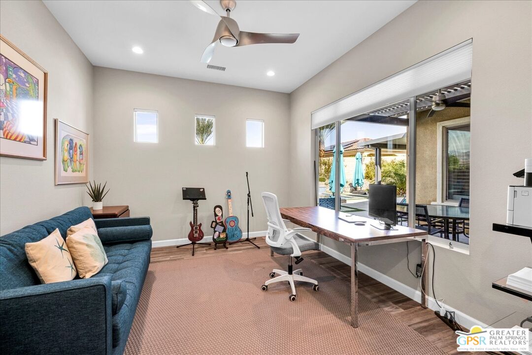 20 Chablis Rancho Mirage, CA 92270 - Photo 24 of 36 a view of a livingroom with workspace and a window