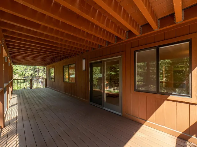 a view of porch with wooden floor and outdoor space
