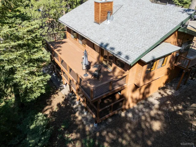 an aerial view of a house having yard