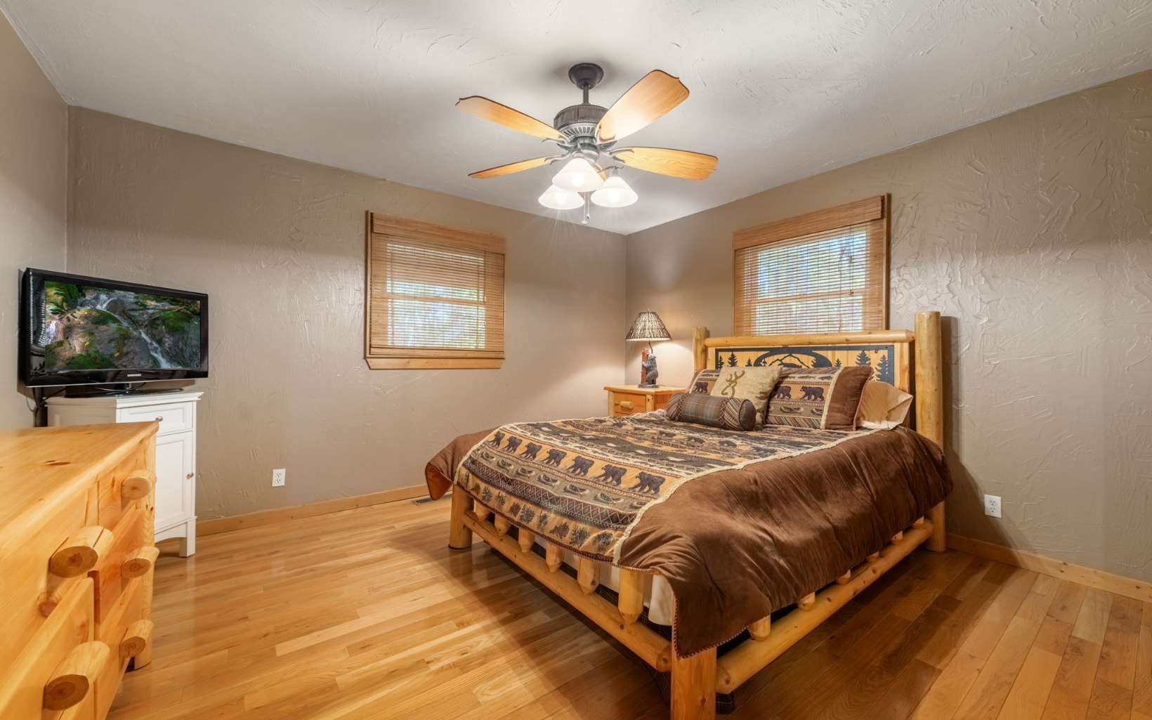 367 Linwood Drive Blue Ridge, GA 30513 - Photo 20 of 56 a bedroom with a bed and a flat screen tv