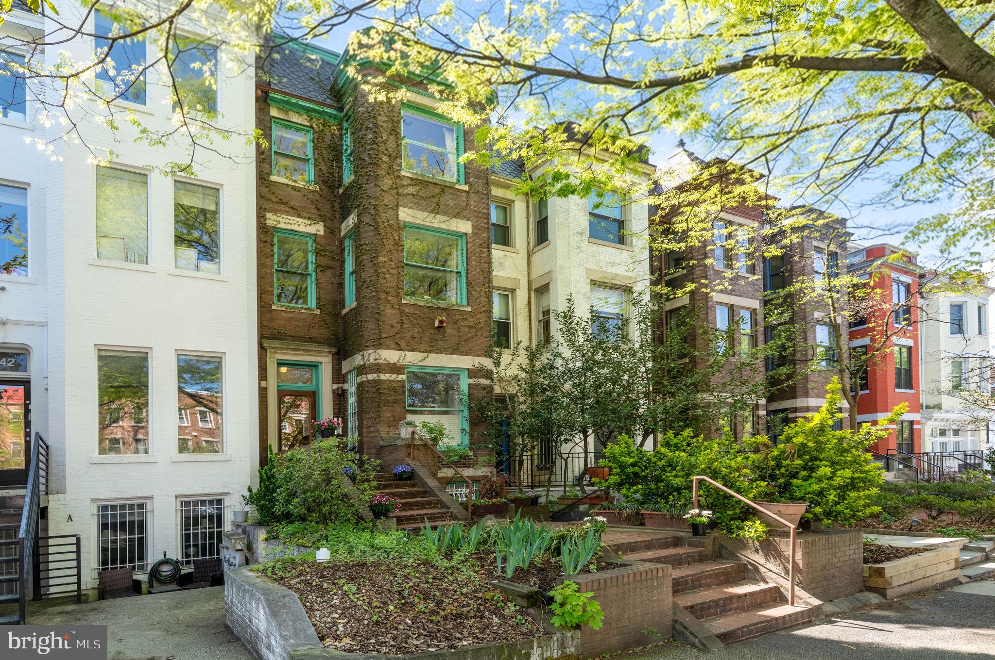 1944 Calvert Street Northwest Washington, DC 20009 - Photo 3 of 85 a front view of a multi story residential apartment building