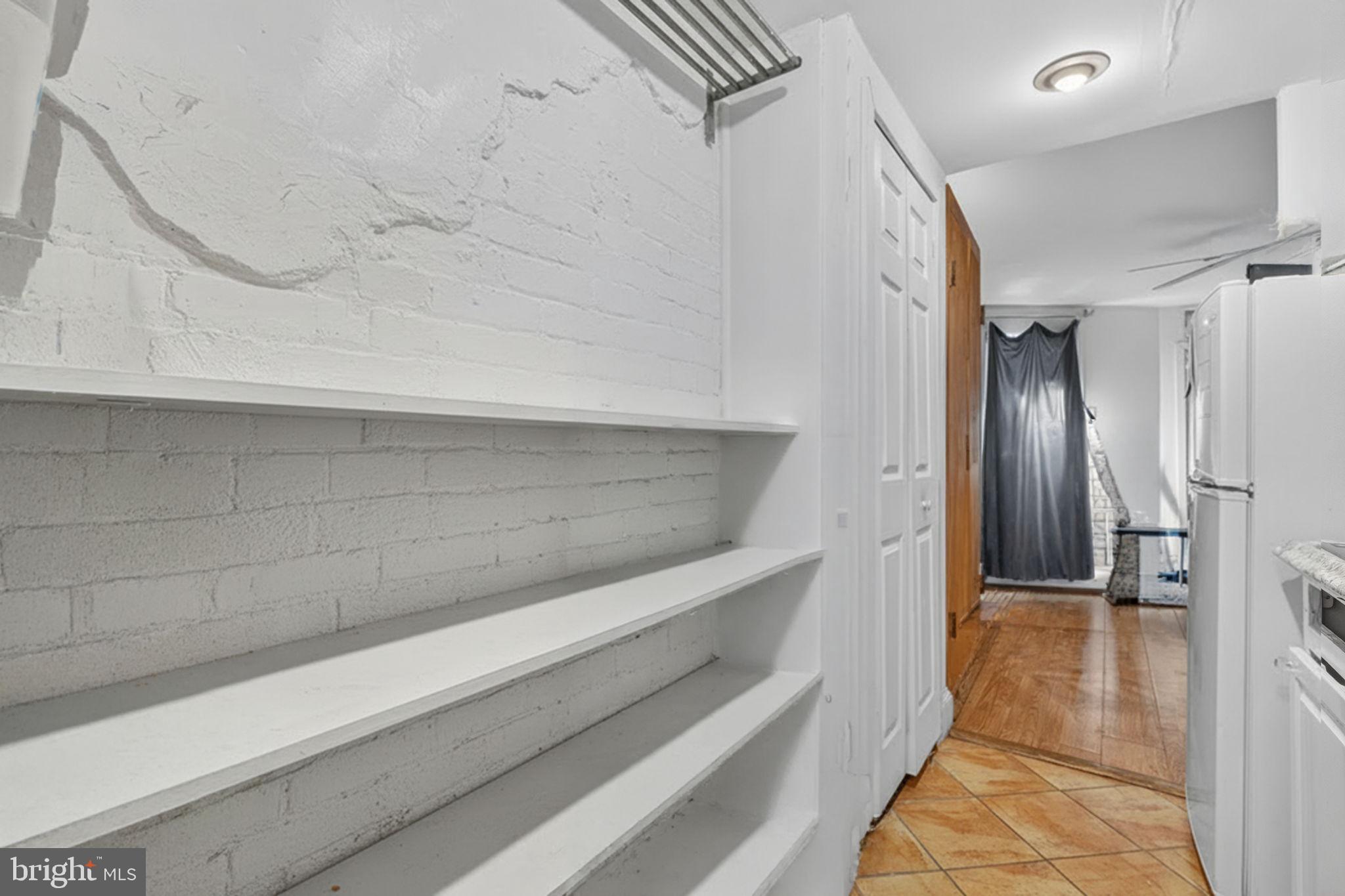 1944 Calvert Street Northwest Washington, DC 20009 - Photo 79 of 85 a bathroom with a shower and a shower