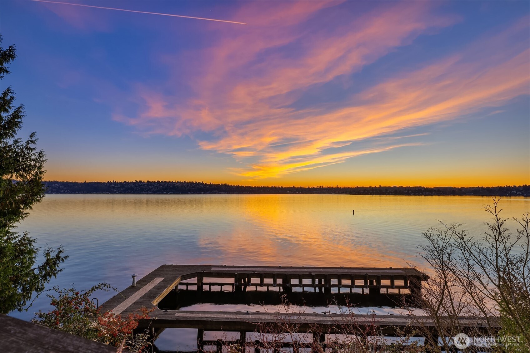 8001 West Mercer Way Mercer Island, WA 98040 - Photo 7 of 20 a view of a lake with a city