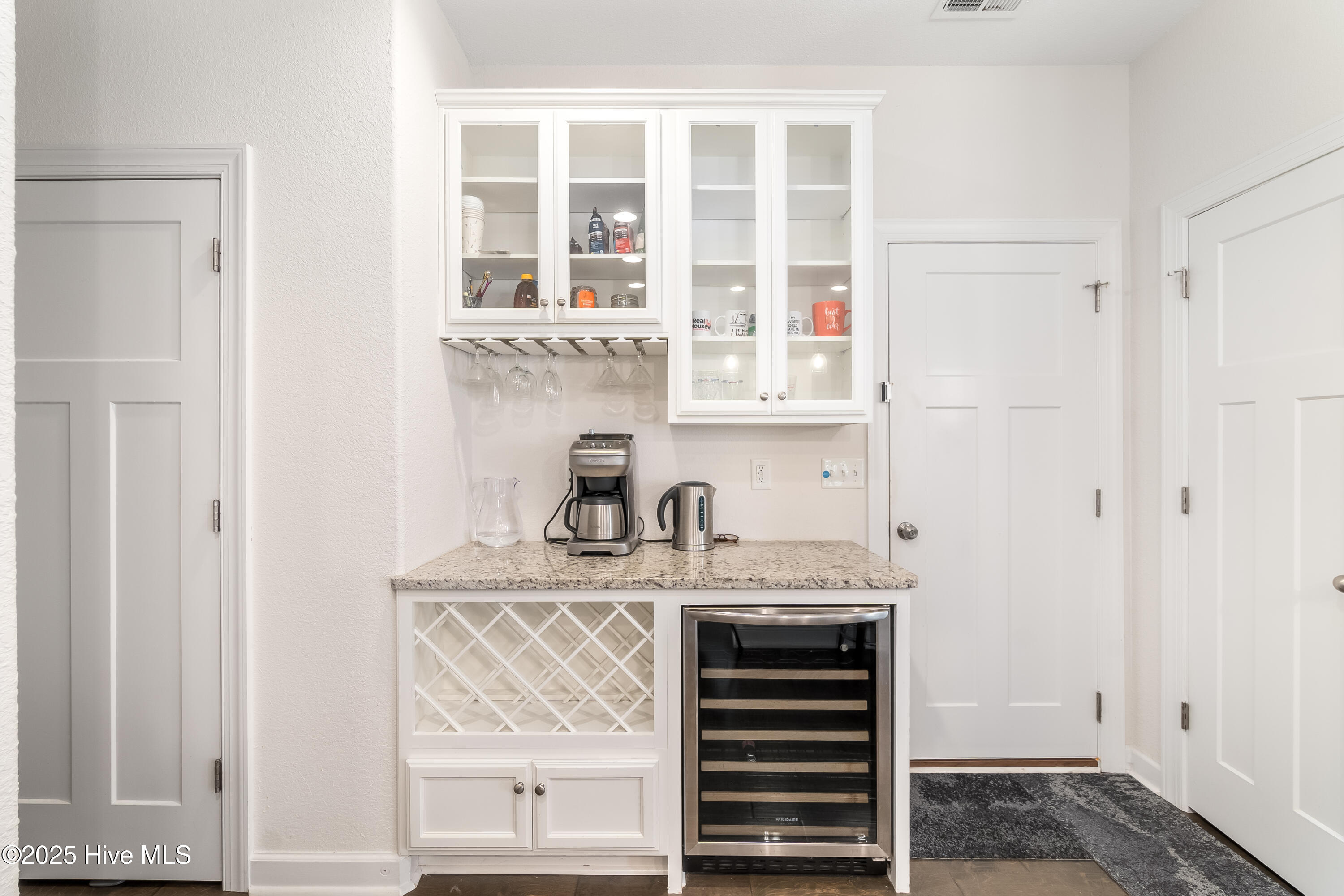 111 Rosedale Court Moyock, NC 27958 - Photo 16 of 36 Butler's Pantry with Wine Refrigerator and Storage