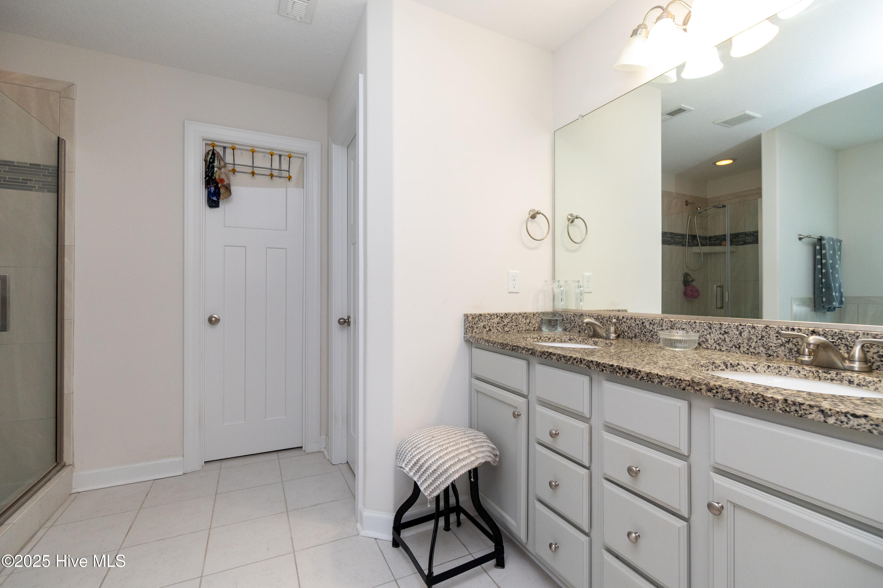 111 Rosedale Court Moyock, NC 27958 - Photo 25 of 36 Primary Bathroom with Walk in Closet
