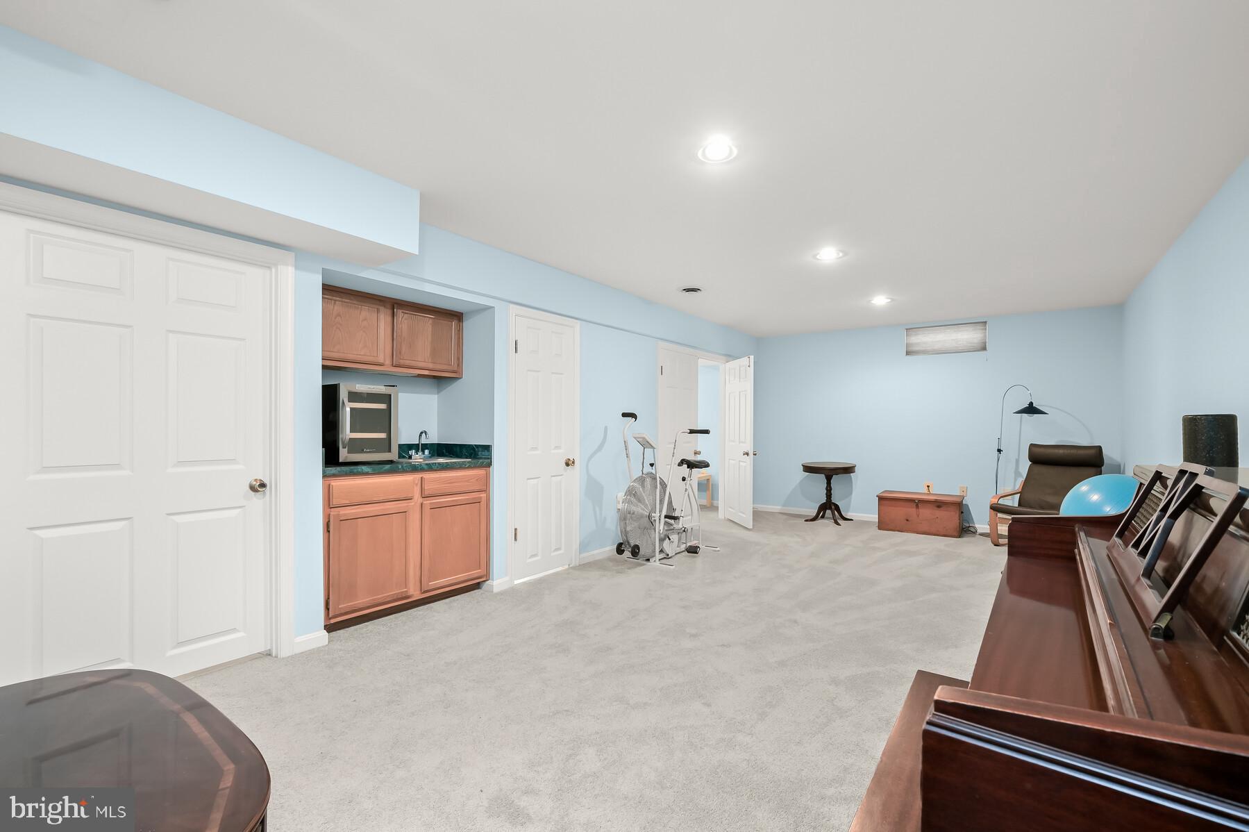 8522 Autumn Rust Road Ellicott City, MD 21043 - Photo 26 of 39 Lower level with plush carpet