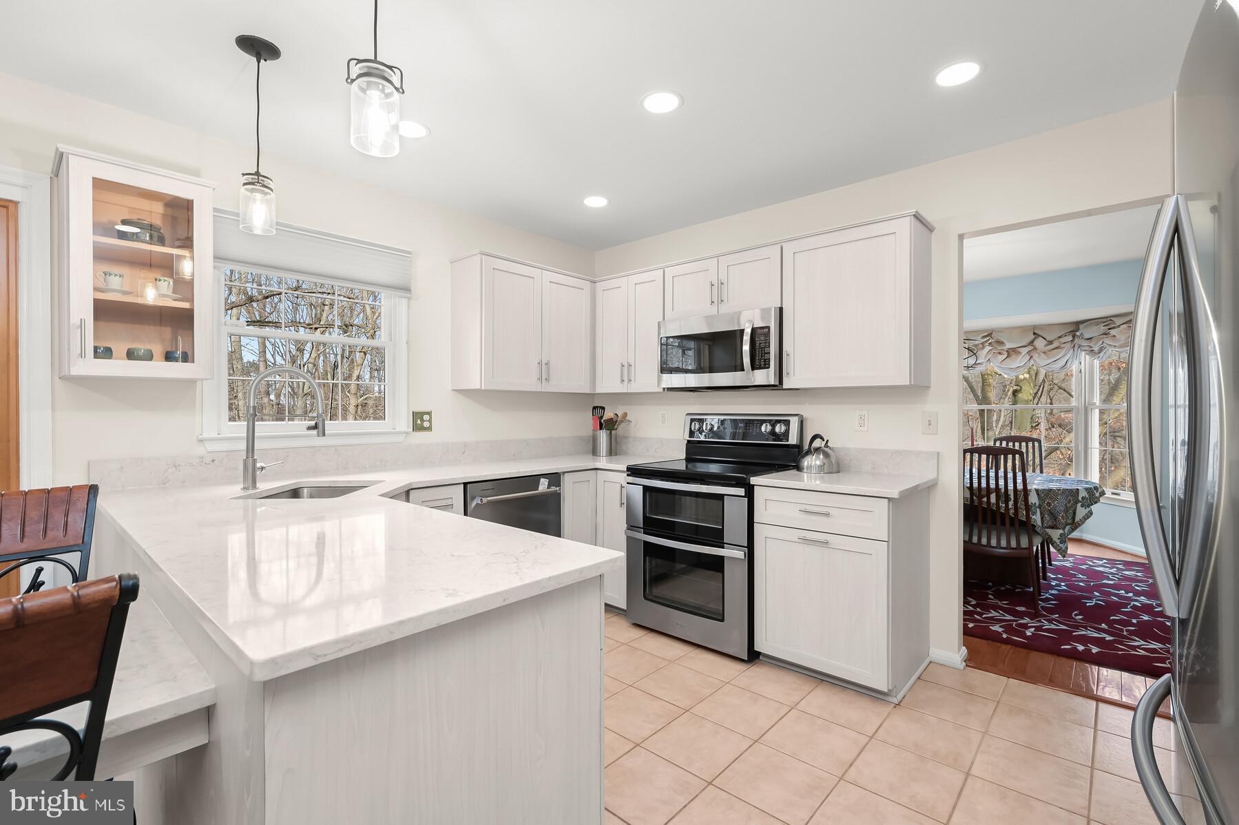 8522 Autumn Rust Road Ellicott City, MD 21043 - Photo 6 of 39 Updated kitchen with stainless steel appliances