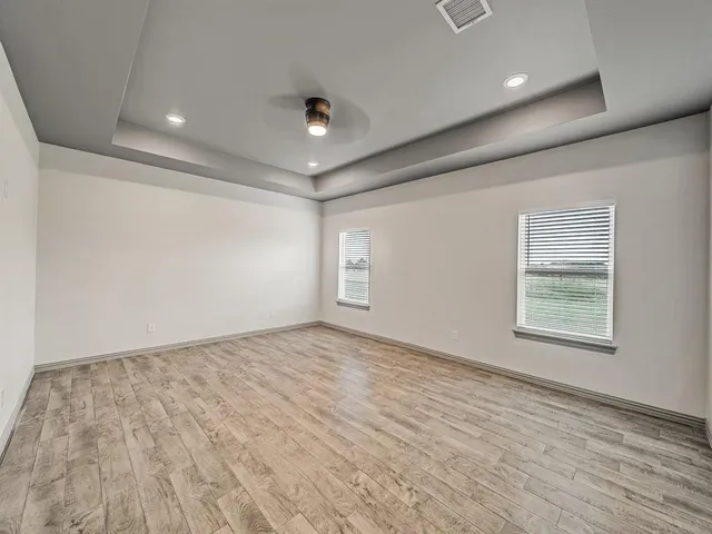 an empty room with windows