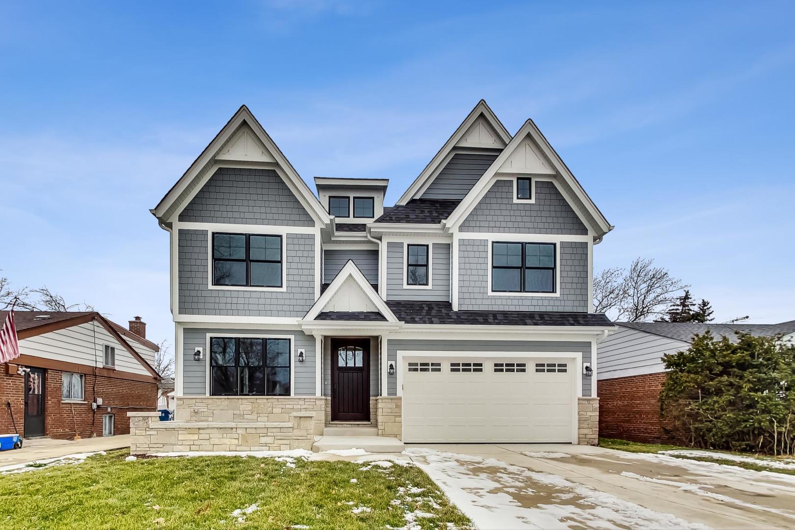150 Avon Road Elmhurst, IL 60126 - Photo 1 of 18 a front view of a house with a yard