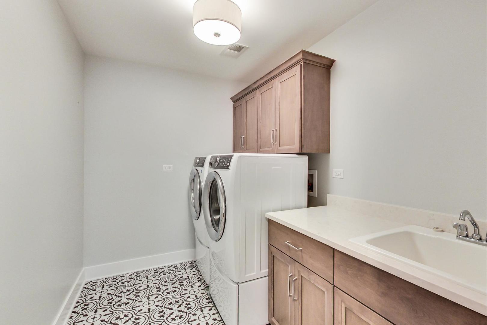 150 Avon Road Elmhurst, IL 60126 - Photo 12 of 18 a utility room with dryer and washer