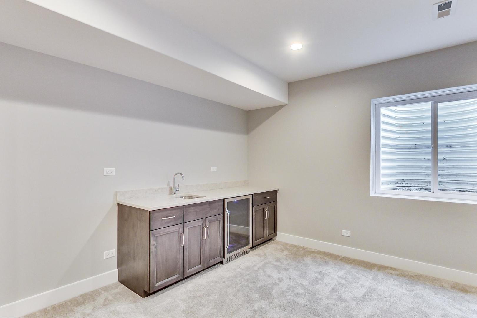 150 Avon Road Elmhurst, IL 60126 - Photo 15 of 18 a view of an empty room with a window