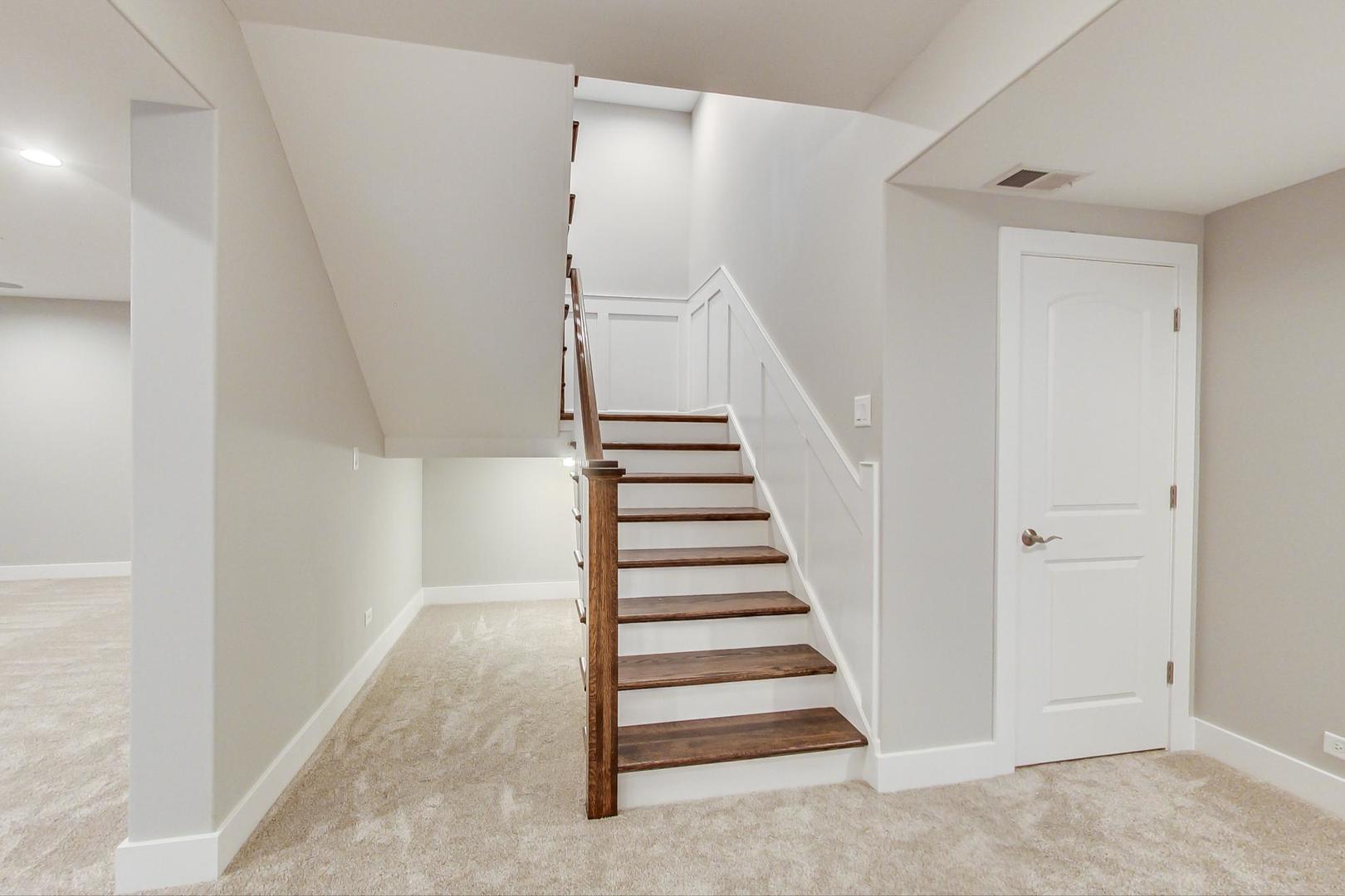 150 Avon Road Elmhurst, IL 60126 - Photo 17 of 18 a view of entryway with stairs and white walls